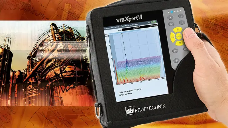 Una sola mano che tiene il VIBXPERT II